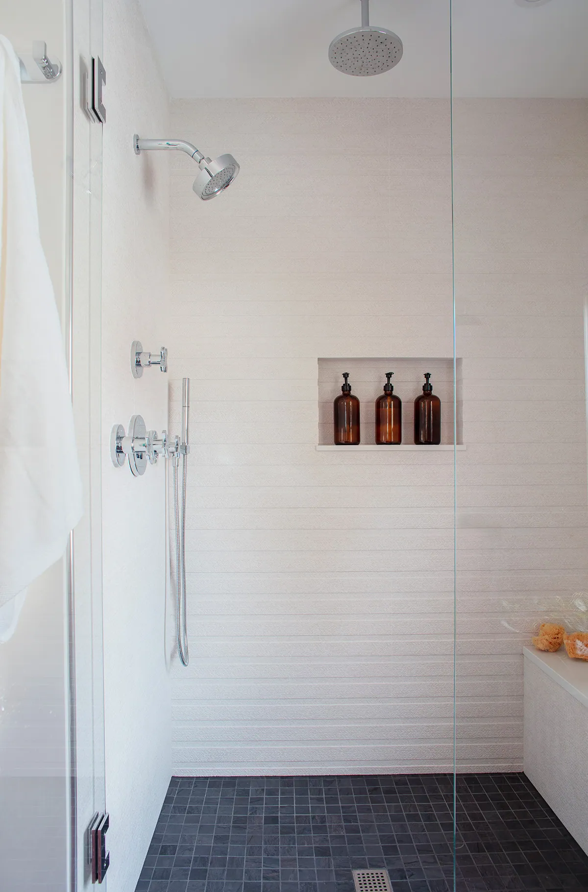 white shower with shelf insert